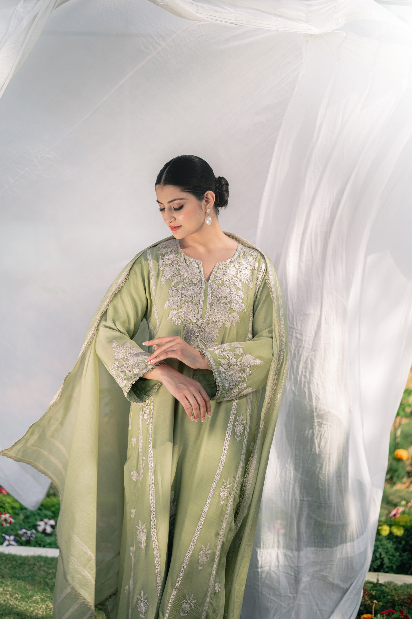 Mint green muslin suit with aari embroidery