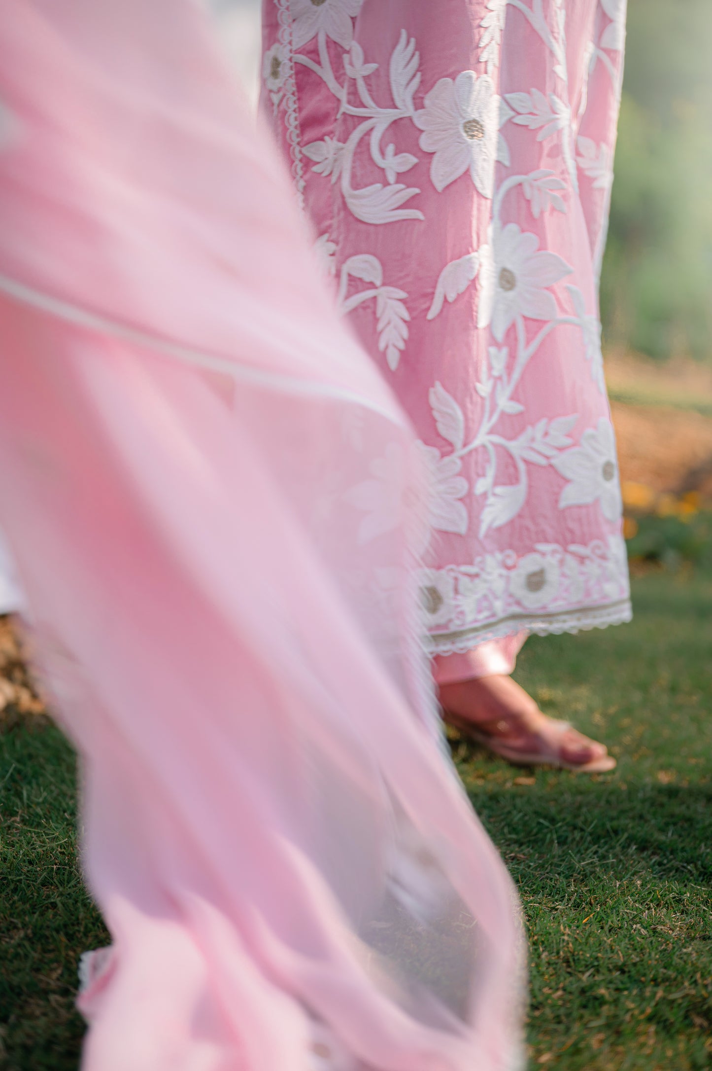 Light pink organza suit with aari embroidery