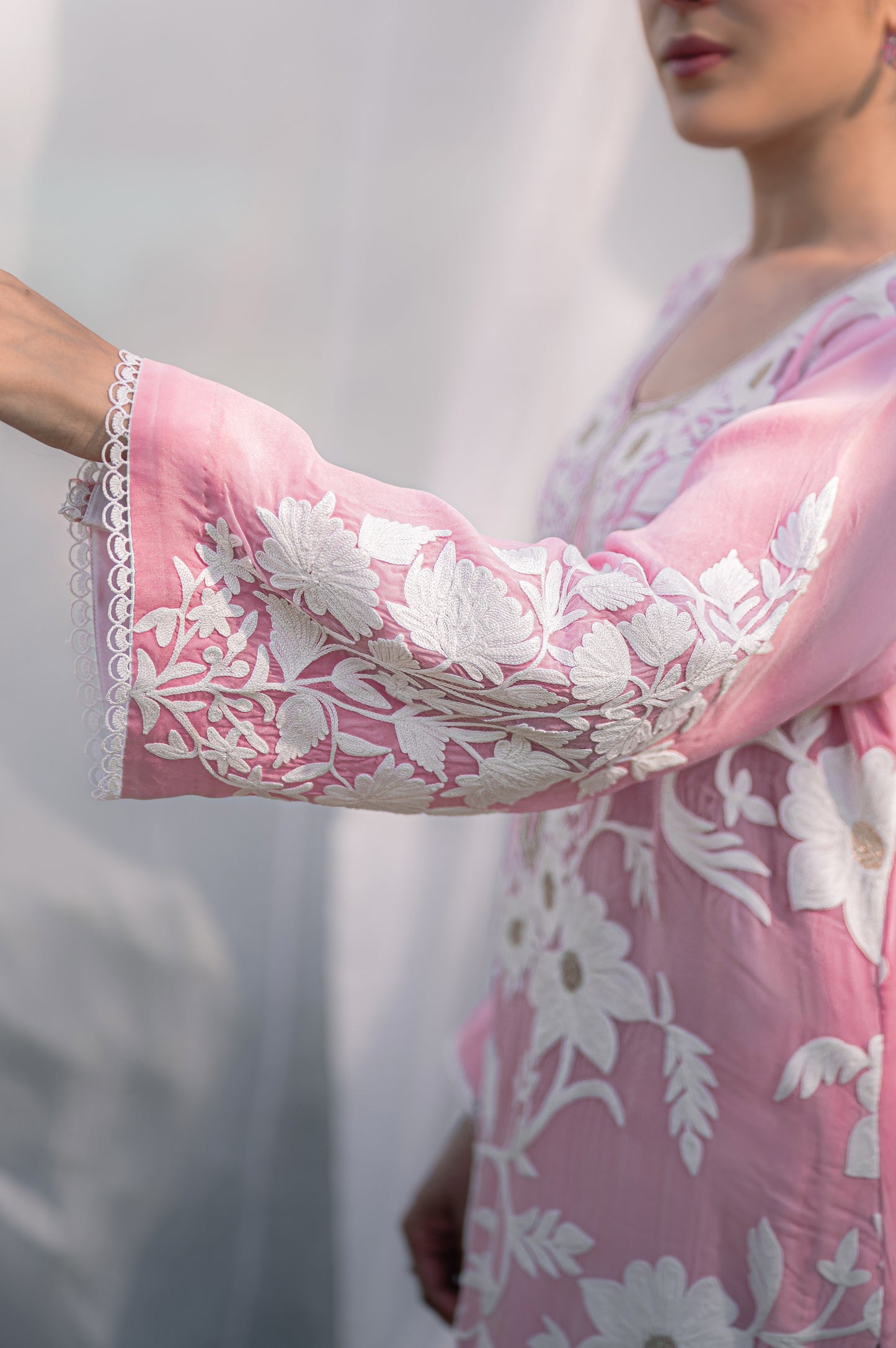 Light pink organza suit with aari embroidery