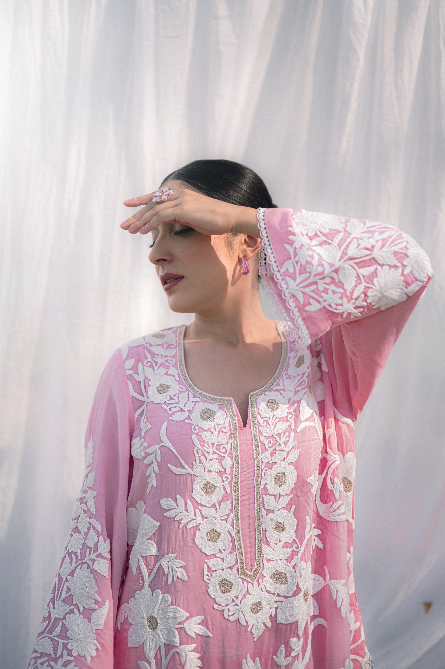 Light pink organza suit with aari embroidery
