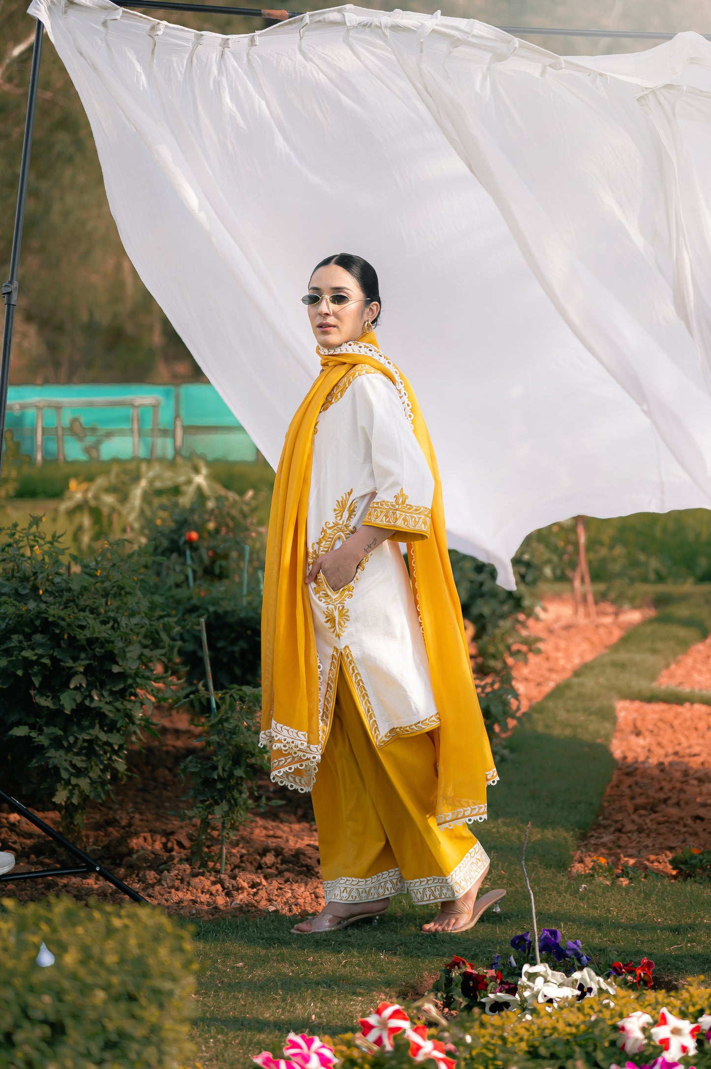 White & mustard cotton suit with aari embroidery
