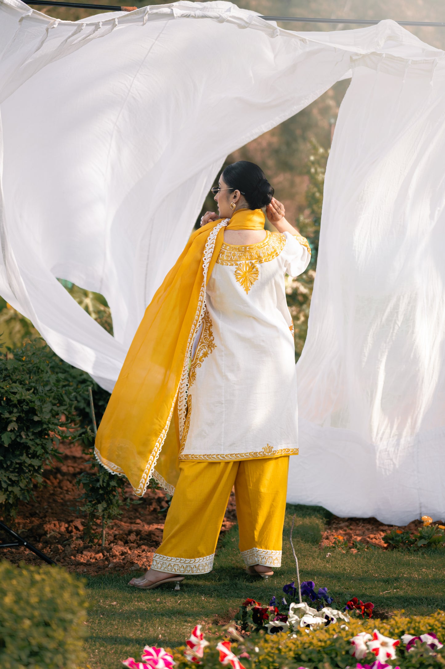 White & mustard cotton suit with aari embroidery