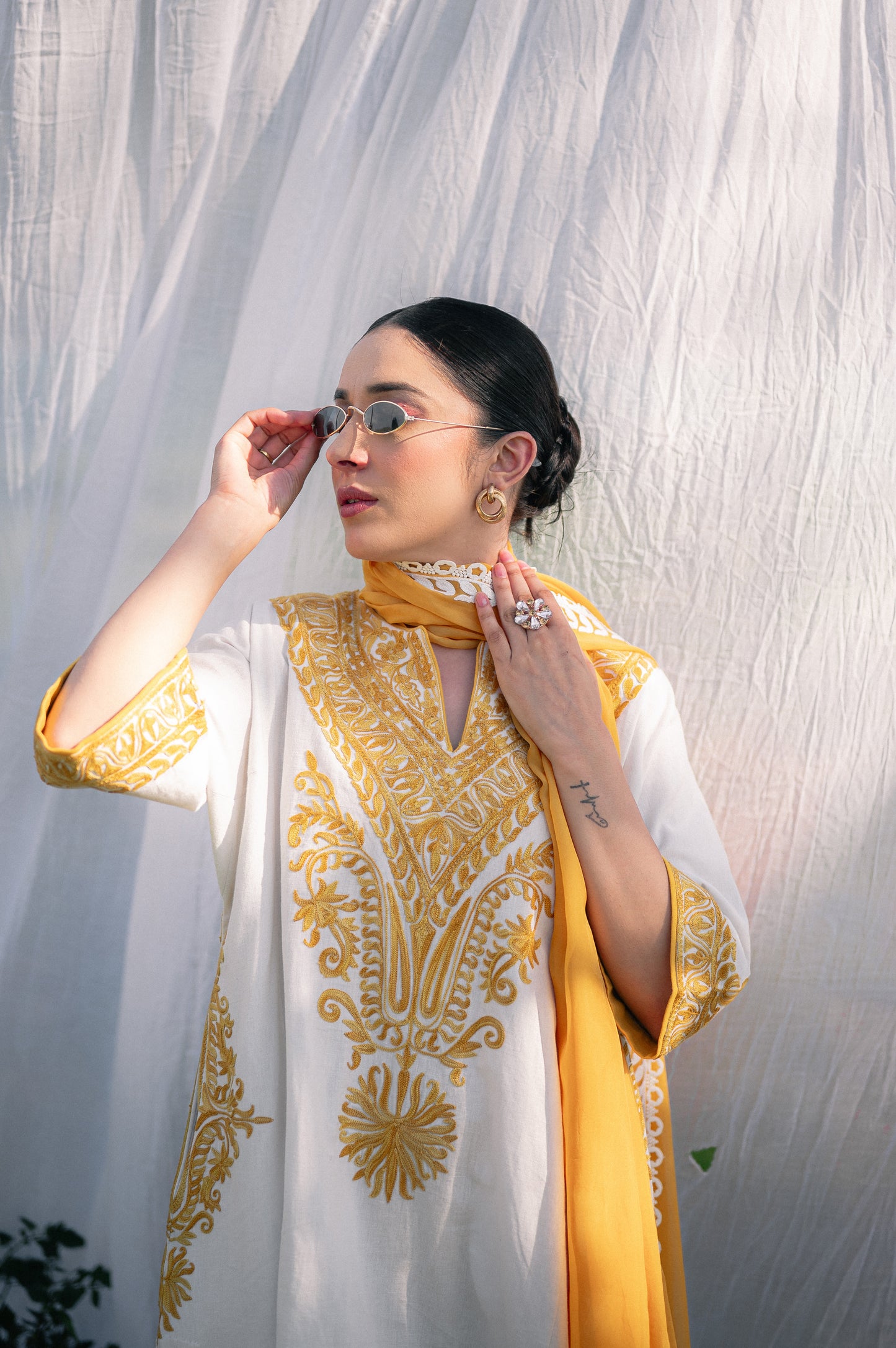 White & mustard cotton suit with aari embroidery