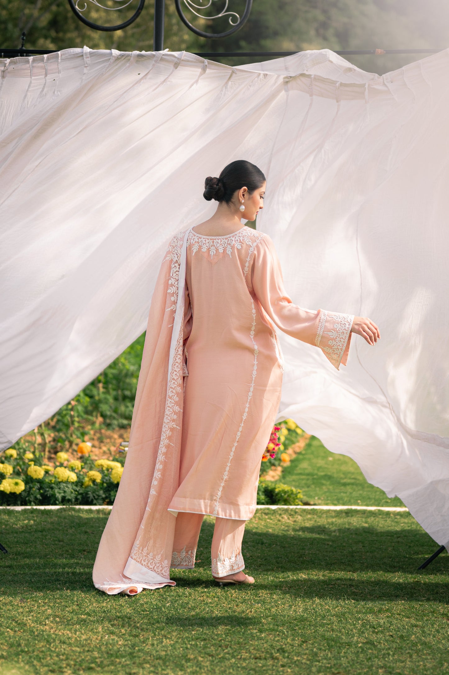 Light peach muslin suit with aari embroidery