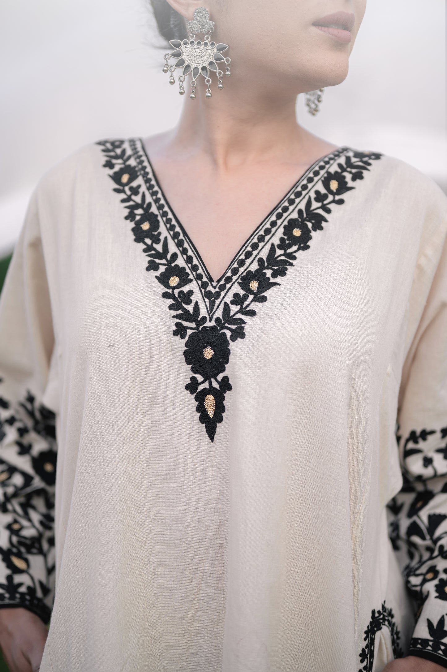 Beige cotton phiran set with black aari embroidery