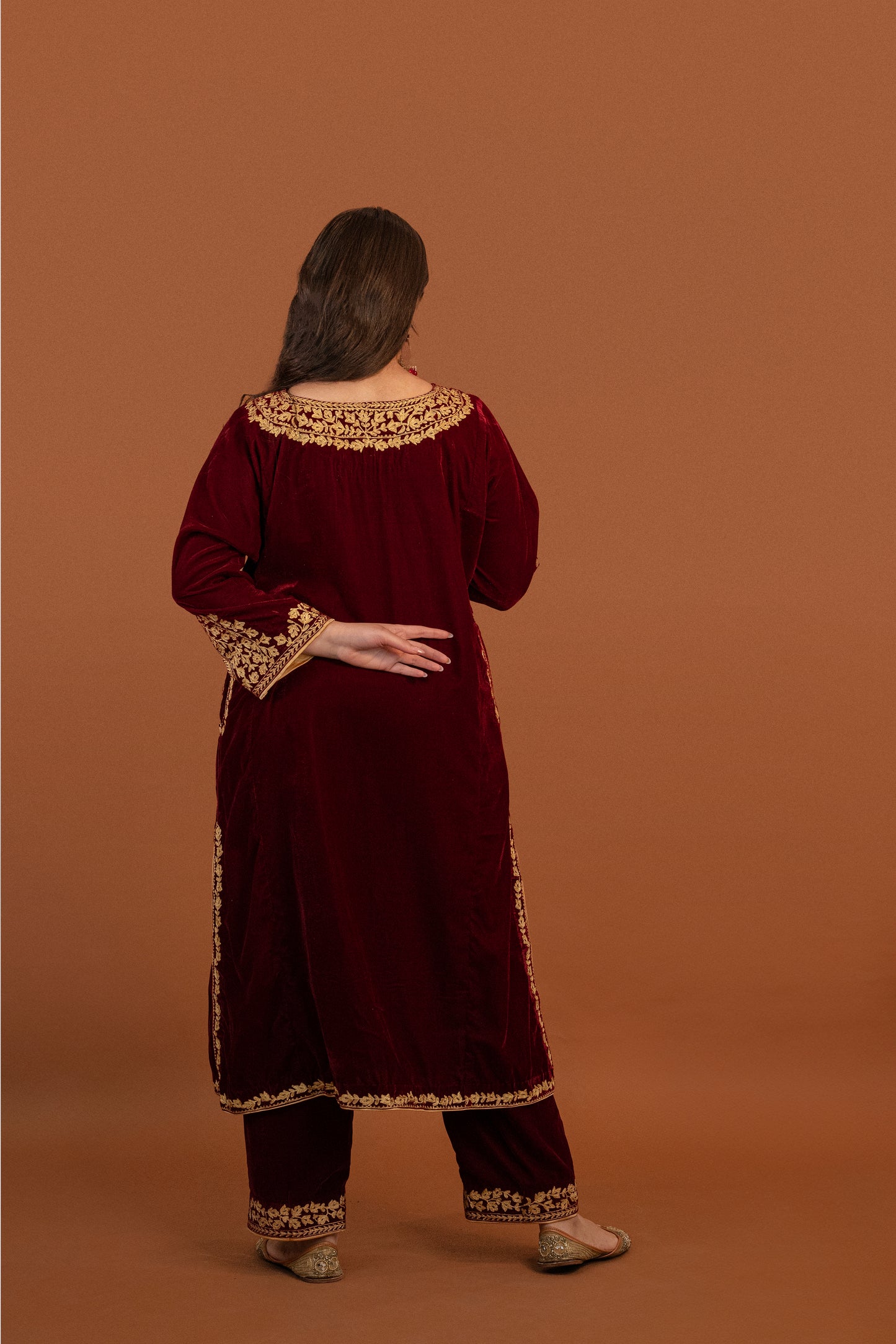 Maroon velvet cutwork aari tilla suit