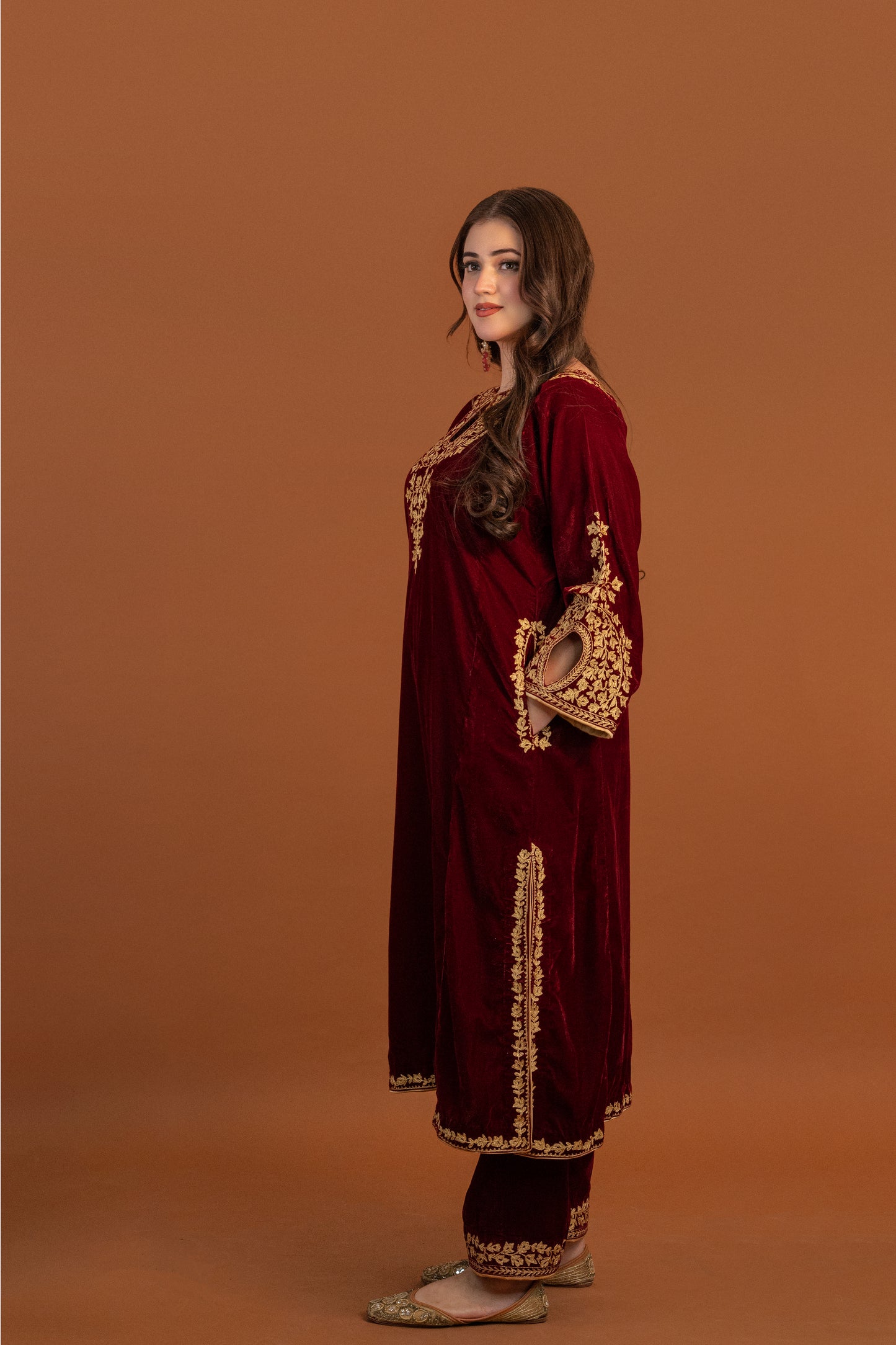 Maroon velvet cutwork aari tilla suit