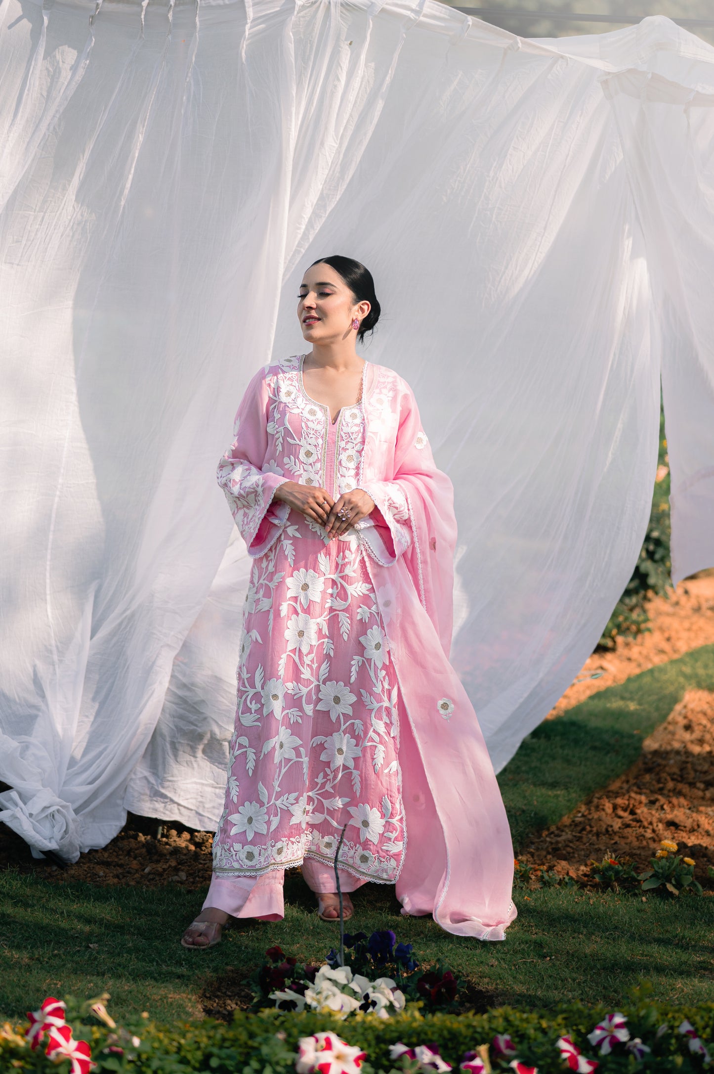 Light pink organza suit with aari embroidery