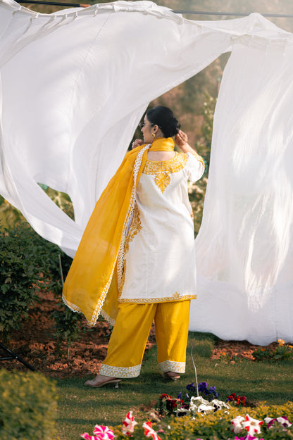 White & mustard cotton suit with aari embroidery