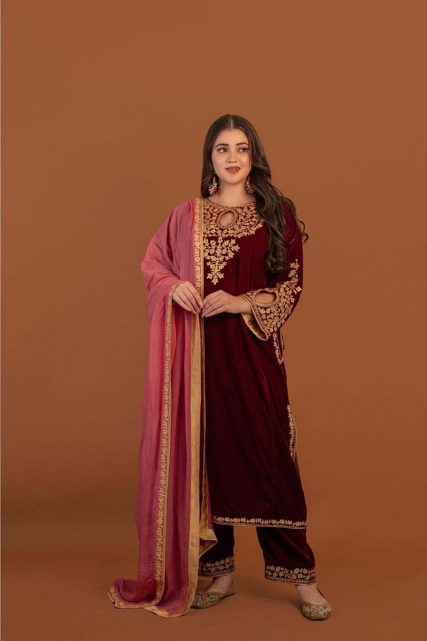 Maroon velvet cutwork aari tilla suit