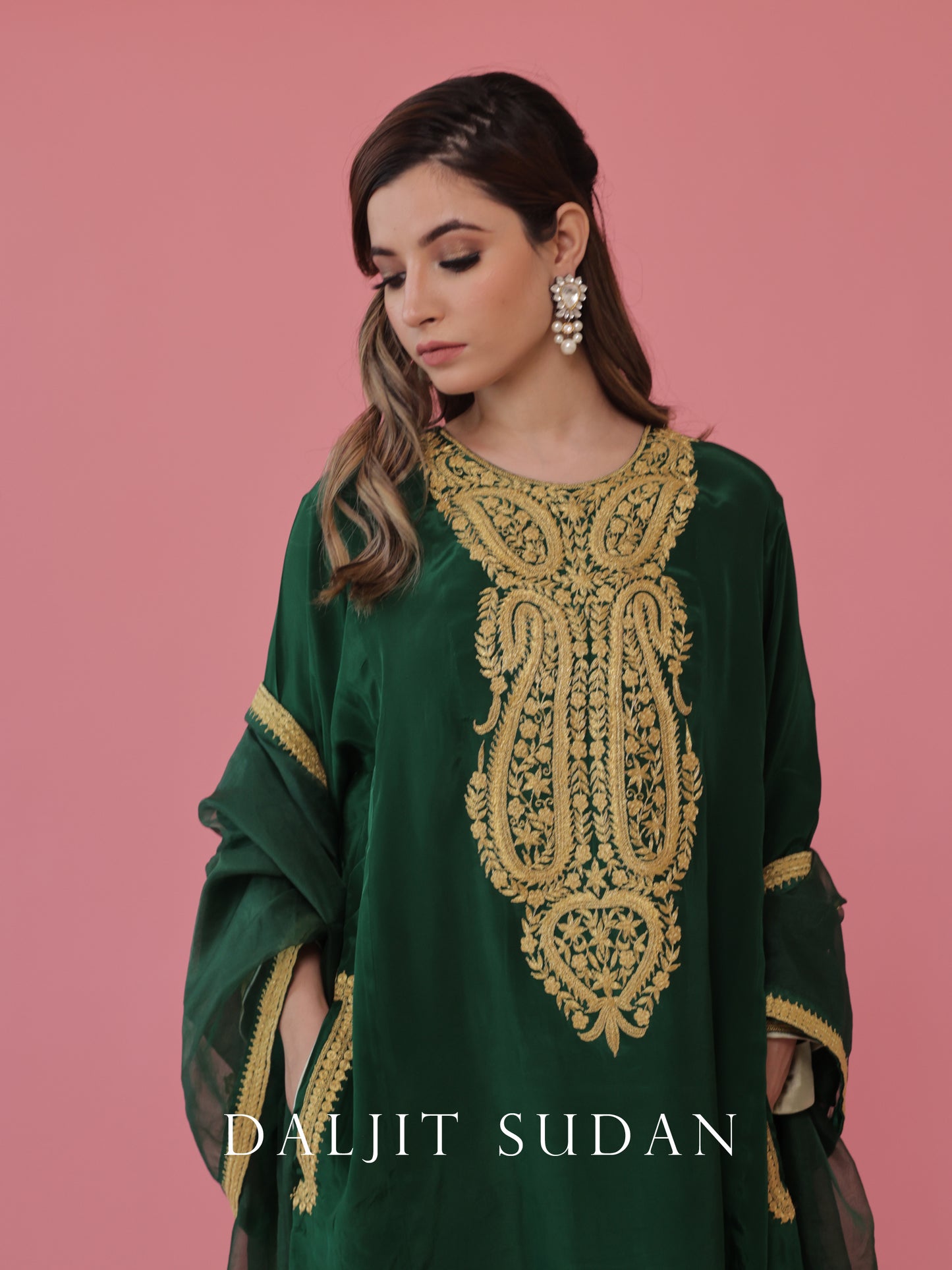 Emerald green crepe phiran suit with tilla embroidery